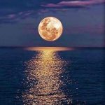 Just a Beautiful Full Moon against a calm Ocean
