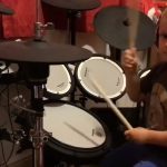 this little boy is a professional drummer