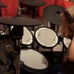 this little boy is a professional drummer