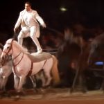 He Stands on his horses for a spectacular number