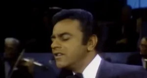 Johnny Mathis 1969 Performance, Ed Sullivan Show Johnny Mathis, Johnny Mathis Moon River, 1969 Music History, Classic TV Music Performances, Johnny Mathis Dear Heart Live, Days of Wine and Roses Mathis, Moon Landing and Music, Historical TV Music Moments, Johnny Mathis Legacy.