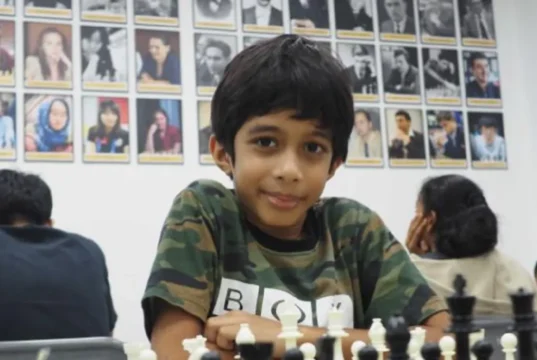 8-Year-Old Chess prodigy victory, Young chess master achievements, Historic chess wins, Child chess champions, Chess talent development, ChessKid online learning, Grandmaster chess upsets, Youth chess competitions, Chess strategy for kids, Inspirational young chess players