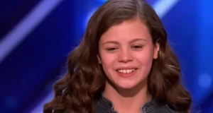 13-year-old singer America's Got Talent, Angelina I'll Stand by You AGT, young talent on America's Got Talent, Simon Cowell AGT performance, AGT standing ovation performance, powerful young singer AGT, America's Got Talent 2024 highlights, best performances on AGT, emotional song performance AGT, young singers on reality TV