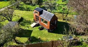 DIY tiny house, affordable tiny house, musician tiny house, sustainable tiny living, tiny house design ideas, creative tiny house, building a tiny house on a budget, small space living tips, tiny house with recycled materials, musician's sustainable home