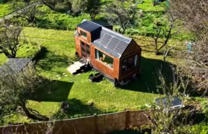 DIY tiny house, affordable tiny house, musician tiny house, sustainable tiny living, tiny house design ideas, creative tiny house, building a tiny house on a budget, small space living tips, tiny house with recycled materials, musician's sustainable home