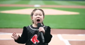 Mirabel Pan Weston National Anthem, WooSox season opener performance, Inspirational child singer, Young national anthem singer, Emotional national anthem rendition, Talented child performers, Overcoming adversity in performance, Heartwarming sports moments, Inspirational stories of young talent, National anthem sung by children, 8-year-old Girl