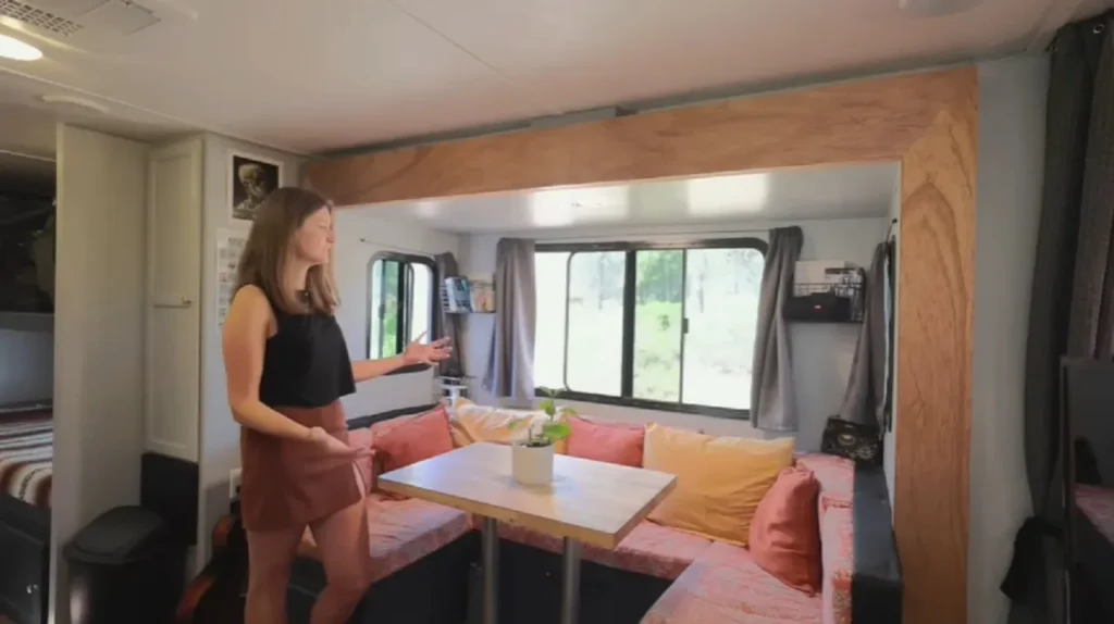 Tiny home living, Travel trailer lifestyle, Mobile home transformation, Downsizing to 300 square feet, Living simply in a trailer, Creative small space living, Minimalist travel lifestyle, Music in tiny spaces, 23-foot trailer renovation, Mobile sanctuary design