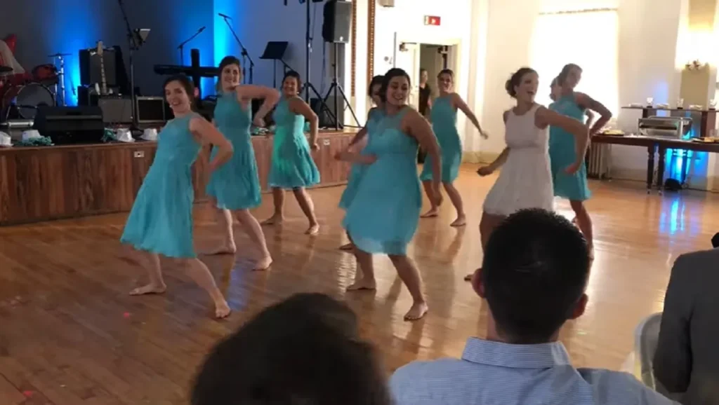 surprise bridesmaids dance, wedding dance, wedding reception, choreography, bridesmaids performance, bride dance, wedding energy, reception transformation, dance styles at weddings, bridal party performance