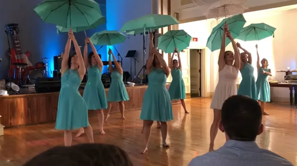 surprise bridesmaids dance, wedding dance, wedding reception, choreography, bridesmaids performance, bride dance, wedding energy, reception transformation, dance styles at weddings, bridal party performance