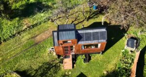 tiny home movement, affordable DIY tiny home, musician tiny home, sustainable living, reclaimed materials, DIY construction, budget-friendly tiny house, personal freedom, creativity and affordability, small space design