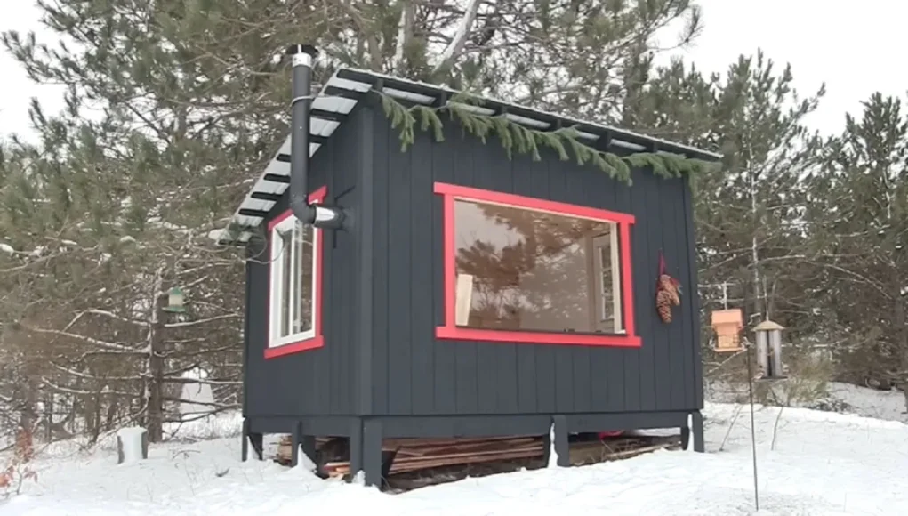 off-grid cabin, affordable cabin building, simple cabin retreat, how to build a cabin, budget-friendly off-grid living, sustainable cabin, off-grid DIY cabin, achievable cabin plans