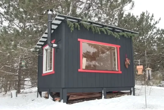 off-grid cabin, affordable cabin building, simple cabin retreat, how to build a cabin, budget-friendly off-grid living, sustainable cabin, off-grid DIY cabin, achievable cabin plans