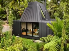 cabin living, modern cabin design, sustainable architecture, New Zealand cabin, minimalist retreat, tranquil living, compact space design, harmony with nature, purple heart Deccan, aluminum tray construction