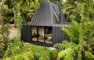 cabin living, modern cabin design, sustainable architecture, New Zealand cabin, minimalist retreat, tranquil living, compact space design, harmony with nature, purple heart Deccan, aluminum tray construction