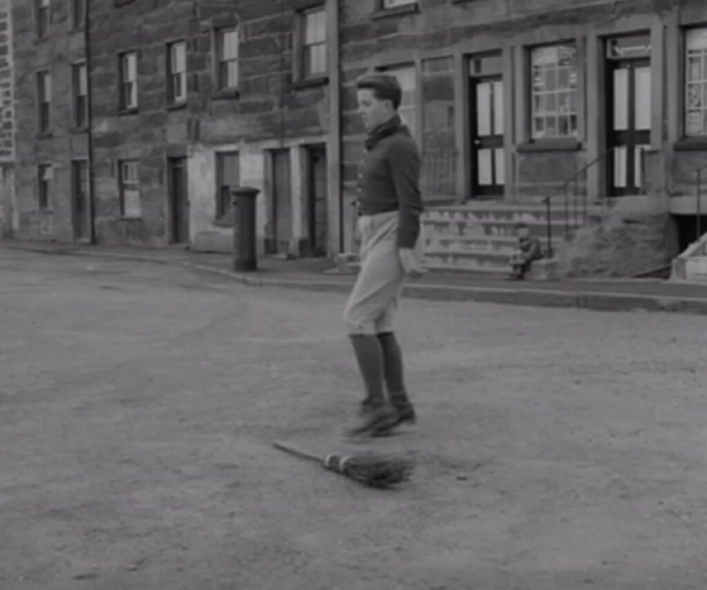 clog dance, Porthmadog 1959, Welsh heritage, traditional dance, clogmaker John Edwards, folk dance preservation, cultural identity, Welsh traditions, North Wales folk dance, community spirit