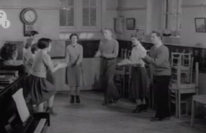 clog dance, Porthmadog 1959, Welsh heritage, traditional dance, clogmaker John Edwards, folk dance preservation, cultural identity, Welsh traditions, North Wales folk dance, community spirit