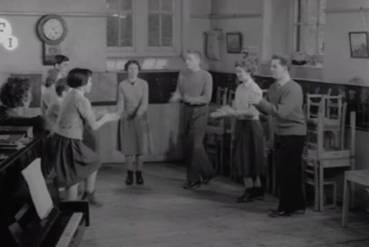 clog dance, Porthmadog 1959, Welsh heritage, traditional dance, clogmaker John Edwards, folk dance preservation, cultural identity, Welsh traditions, North Wales folk dance, community spirit