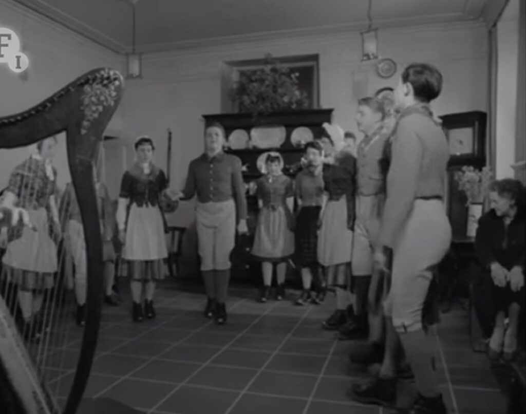 clog dance, Porthmadog 1959, Welsh heritage, traditional dance, clogmaker John Edwards, folk dance preservation, cultural identity, Welsh traditions, North Wales folk dance, community spirit