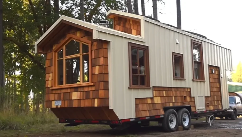 tiny house movement, handcrafted tiny house, modern aesthetics, downsizing benefits, sustainable living, tiny home craftsmanship, functional design, cozy tiny home, space-saving solutions, traditional warmth