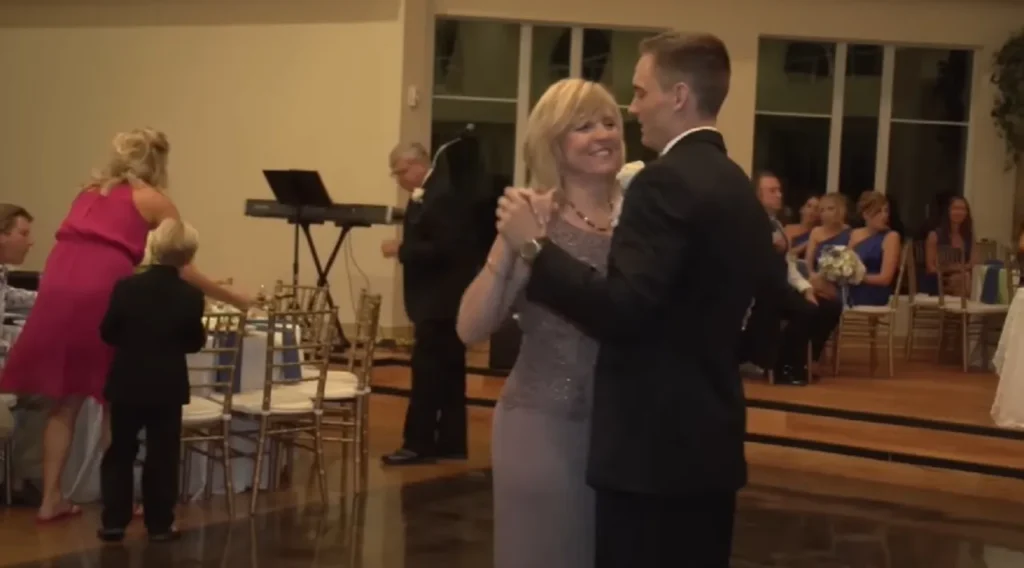 wedding dance, mother-son dance, Houston wedding, creative wedding moments, choreographed dance, wedding entertainment, wedding humor, family bond, unique wedding ideas, unforgettable wedding