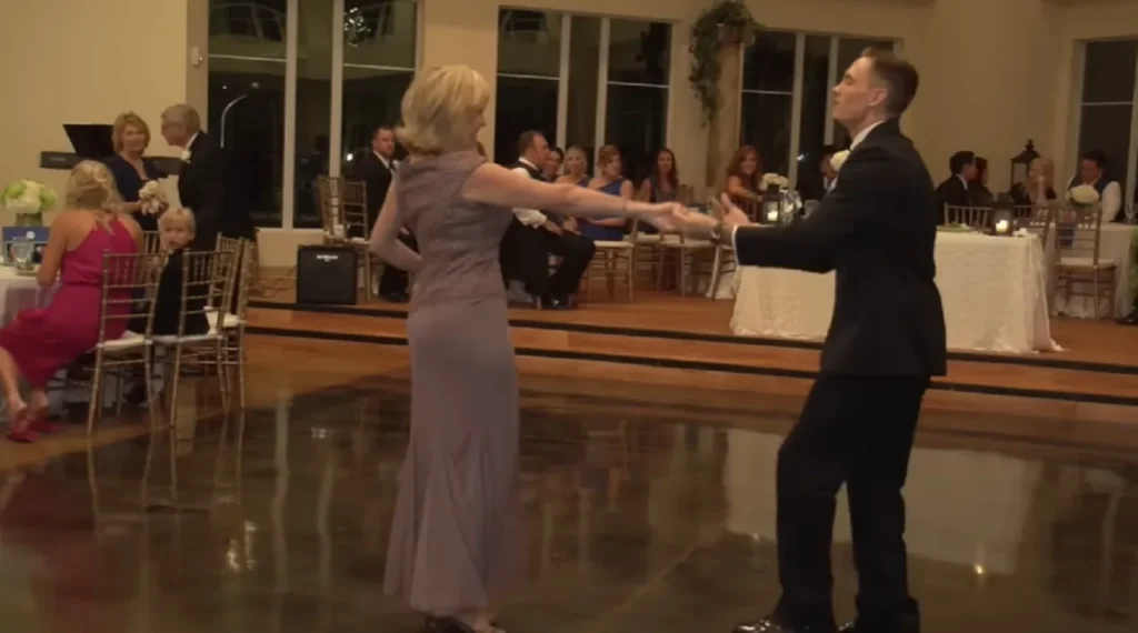 wedding dance, mother-son dance, Houston wedding, creative wedding moments, choreographed dance, wedding entertainment, wedding humor, family bond, unique wedding ideas, unforgettable wedding