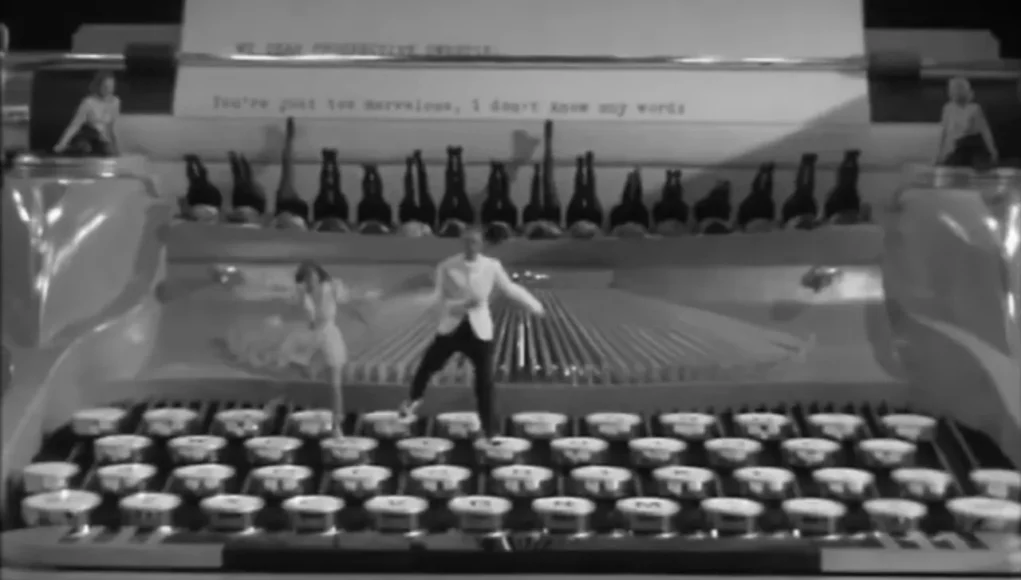 Ruby Keeler tap dance, Lee Dixon typewriter dance, 1937 Hollywood dance scene, iconic tap routines, Ready Willing and Able dance, classic film tap dance, giant typewriter dance, Bobby Connolly choreography, Golden Age of Hollywood dance, Ruby Keeler Lee Dixon