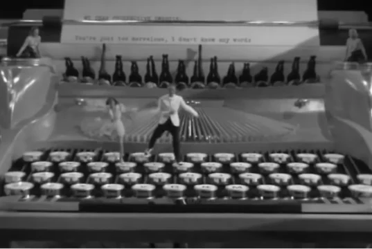 Ruby Keeler tap dance, Lee Dixon typewriter dance, 1937 Hollywood dance scene, iconic tap routines, Ready Willing and Able dance, classic film tap dance, giant typewriter dance, Bobby Connolly choreography, Golden Age of Hollywood dance, Ruby Keeler Lee Dixon