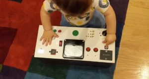 button box for toddlers, DIY sensory board, interactive toddler toys, fine motor skills development, DIY electronics for kids