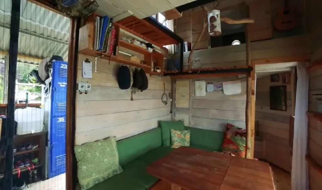 off-grid tiny house, sustainable tiny living, salvaged material home, eco-friendly tiny home, minimalist home design, mobile tiny house, permaculture tiny house, tiny house on wheels, alternative living solutions, sustainable off-grid lifestyle