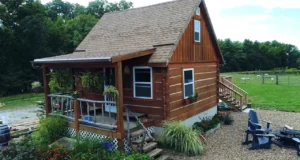 tiny house movement, off-grid living, Doug and Stacy cabin, pioneer-style tiny house, sustainable living, minimalist lifestyle, craftsmanship in tiny houses, renewable energy for cabins, tiny house design, rustic-modern cabins