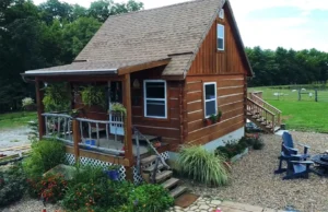 tiny house movement, off-grid living, Doug and Stacy cabin, pioneer-style tiny house, sustainable living, minimalist lifestyle, craftsmanship in tiny houses, renewable energy for cabins, tiny house design, rustic-modern cabins