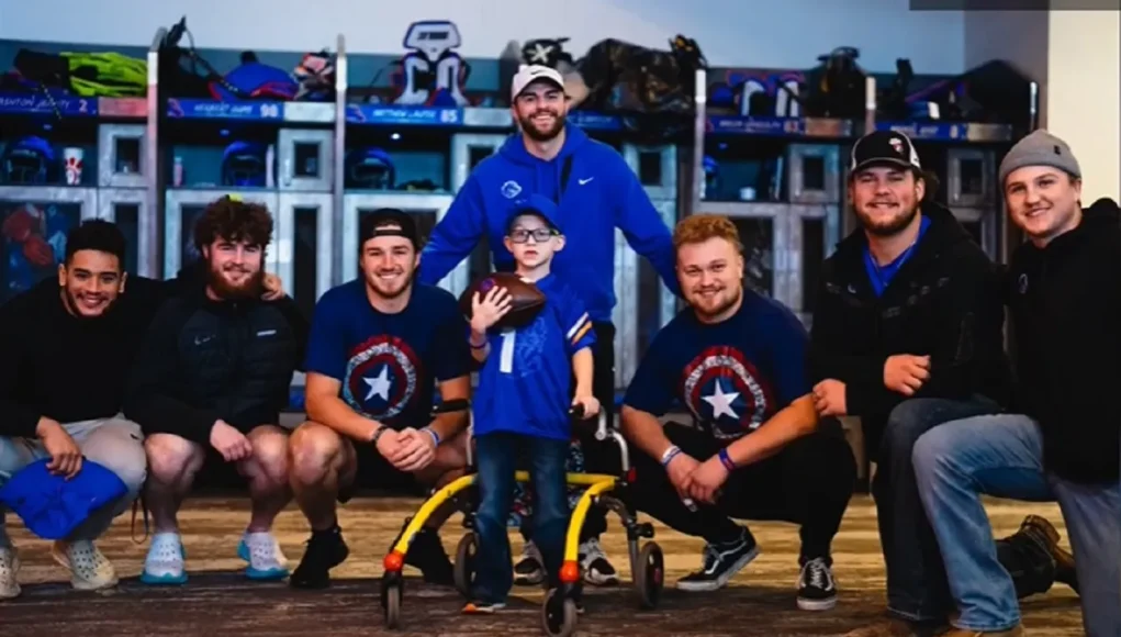 Boise State Broncos recruit, Team IMPACT, 6-year-old football recruit, inspiring sports stories, inclusivity in sports, child with leukodystrophy