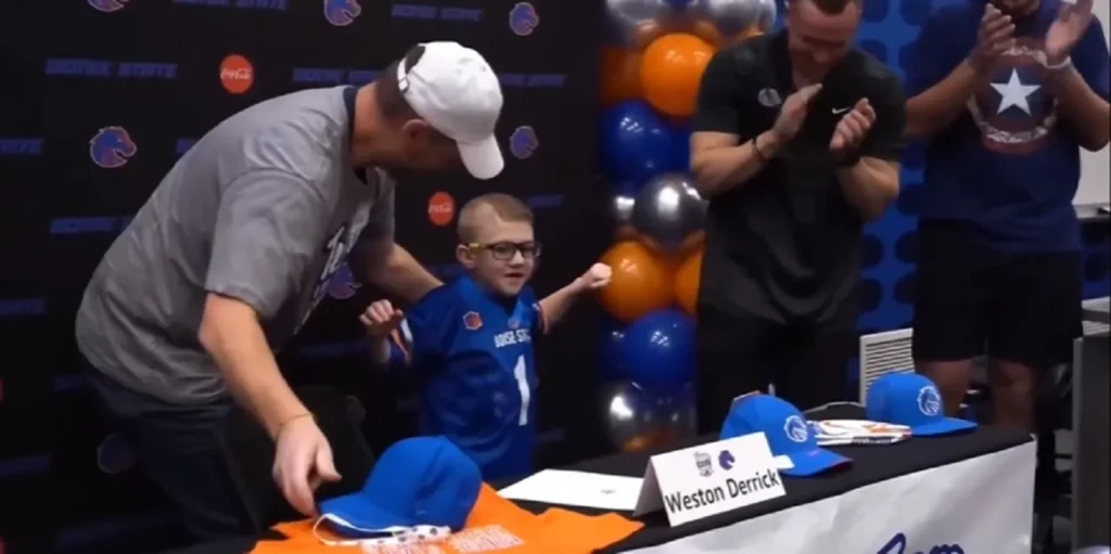 Boise State Broncos recruit, Team IMPACT, 6-year-old football recruit, inspiring sports stories, inclusivity in sports, child with leukodystrophy
